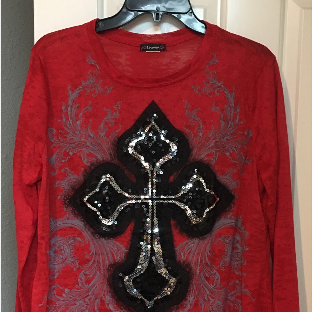 Cocomo brand; size small, red and black top